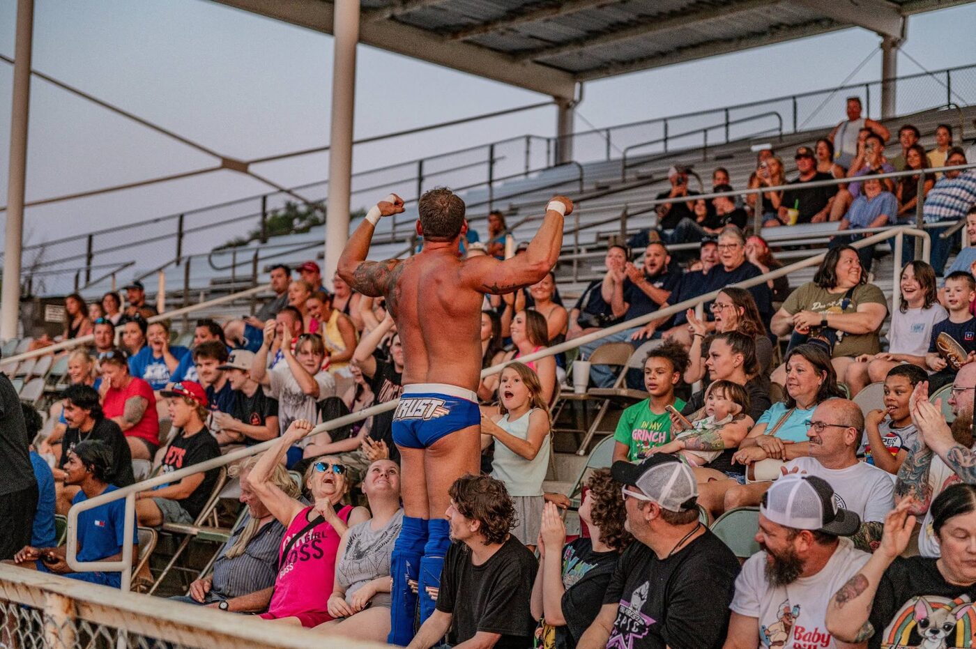Pro Wrestling Epic champion celebrates with the crowd