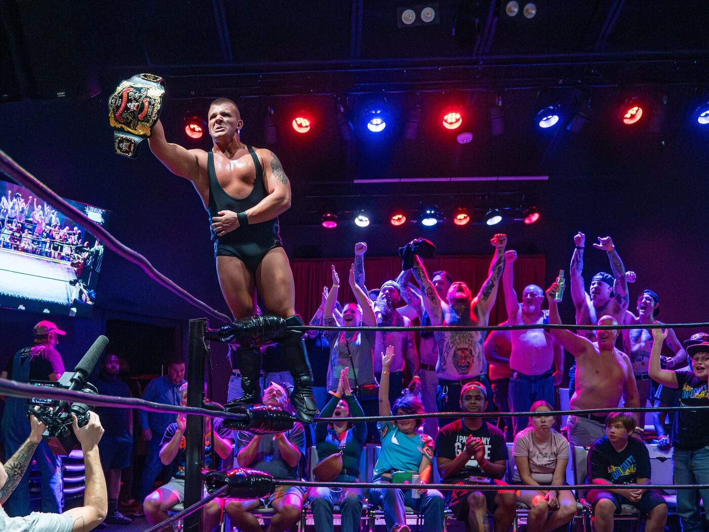 Pro Wrestling Epic wrestler celebrates in the stands