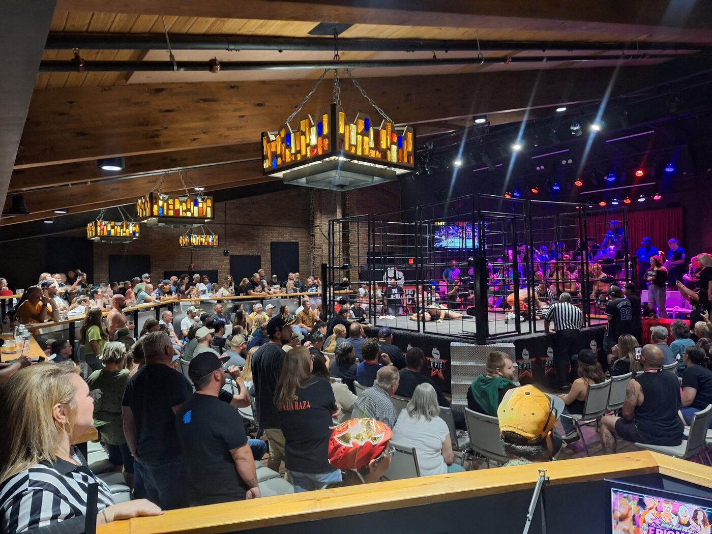 Packed crowd at a Pro Wrestling Epic event at The Mill Event Center